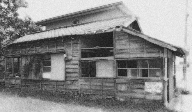 black & white photograph dilapidated house