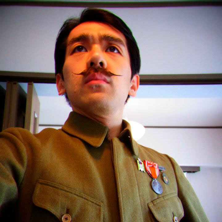 man with mustache in soldier costume