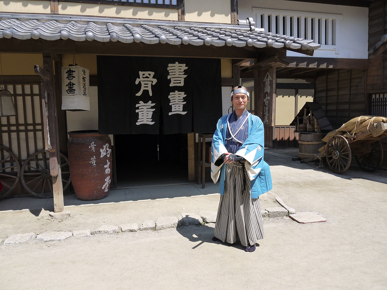 Takahiro Hotta posing on set