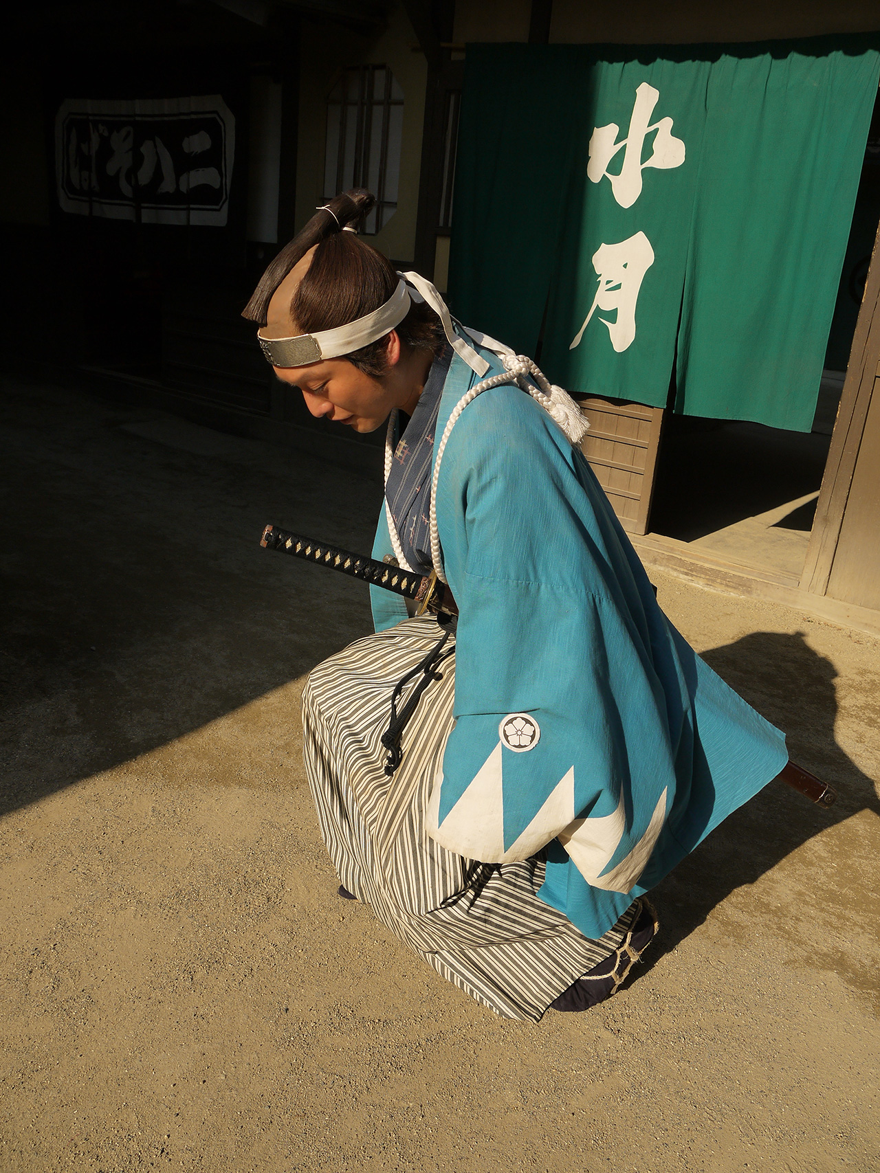 Takahiro Hotta kneeling