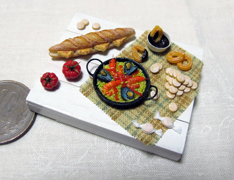 Miniature paella and baguette