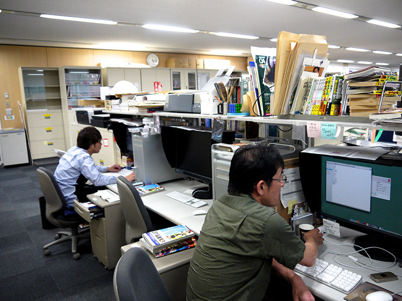 two men working at shueisha in japan