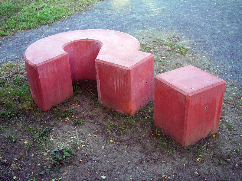 bench shaped like a giant red question mark
