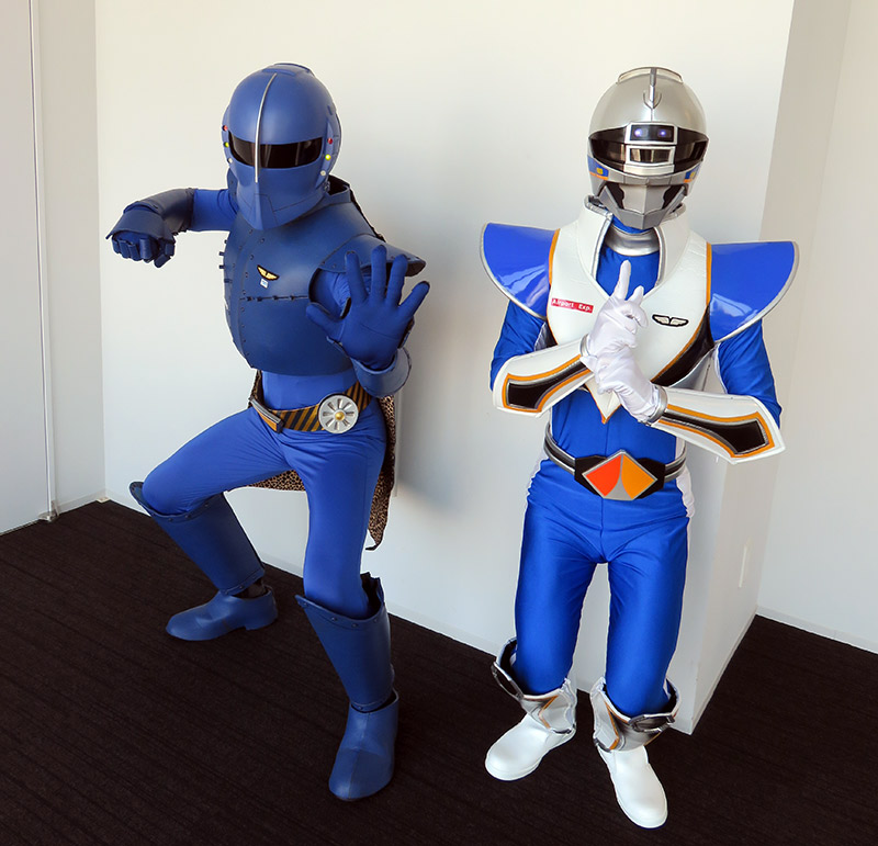 Rapi:tldier the Japanese train superhero posing with a friend