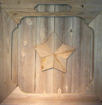 five pointed star carved on wooden door