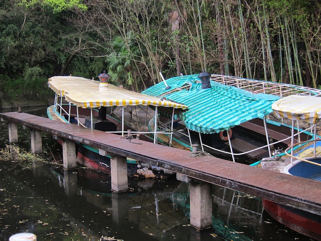 Rusty boats at the abandoned Japanese amusement park Nara Dreamland