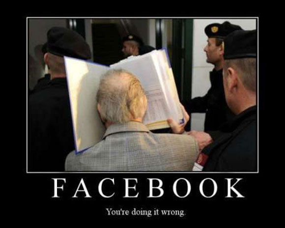 Man smashing his face into a book with the caption: Facebook, you’re doing it wrong