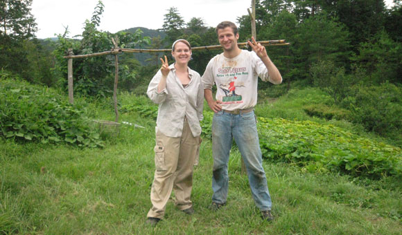 WWOOF farmers making a peace sign