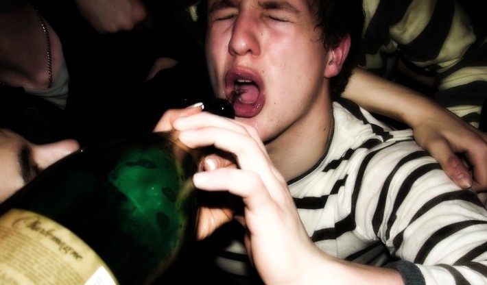 A man chugs a bottle of champagne in Japan