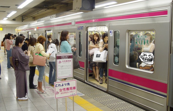 Troll face in a crowded women-only train car