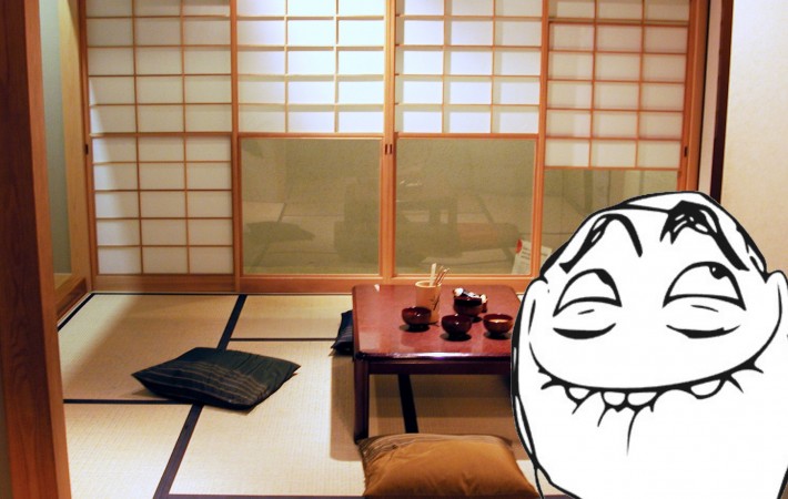 Japanese dining room with cushions and dishes left out with trollface overlaid