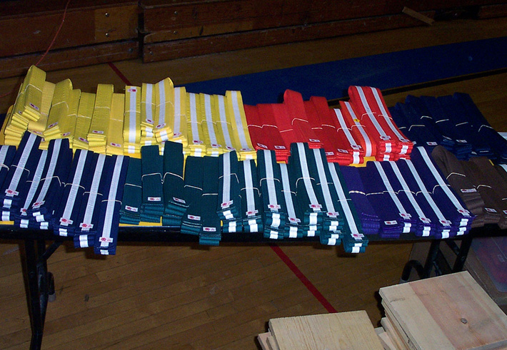 kendo belts different colors on a table