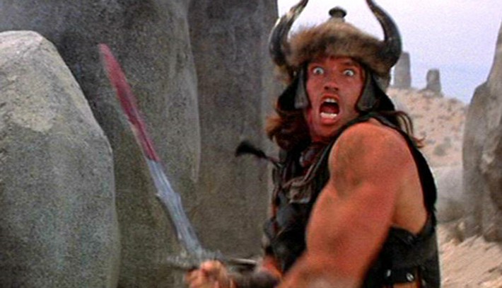 Conan the Barbarian rushing at the camera