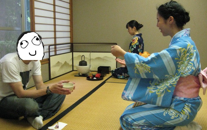 Anonymous man being served at a tea ceremony