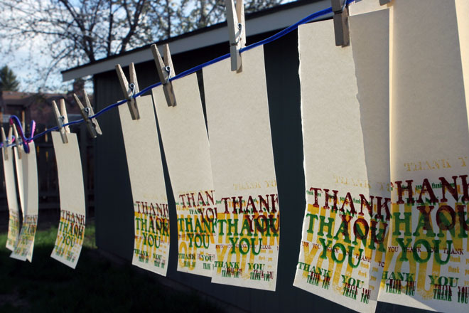 Several Thank You cards hung on clothesline