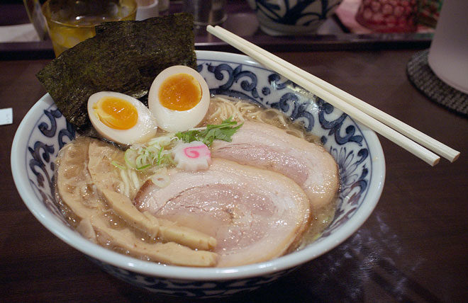 Two boiled eggs in a bowl of ramen