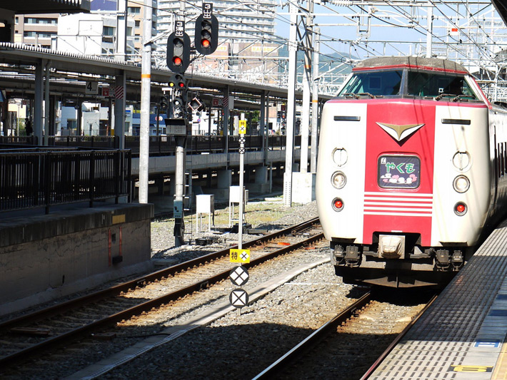 front of a japanese train coming into the platform