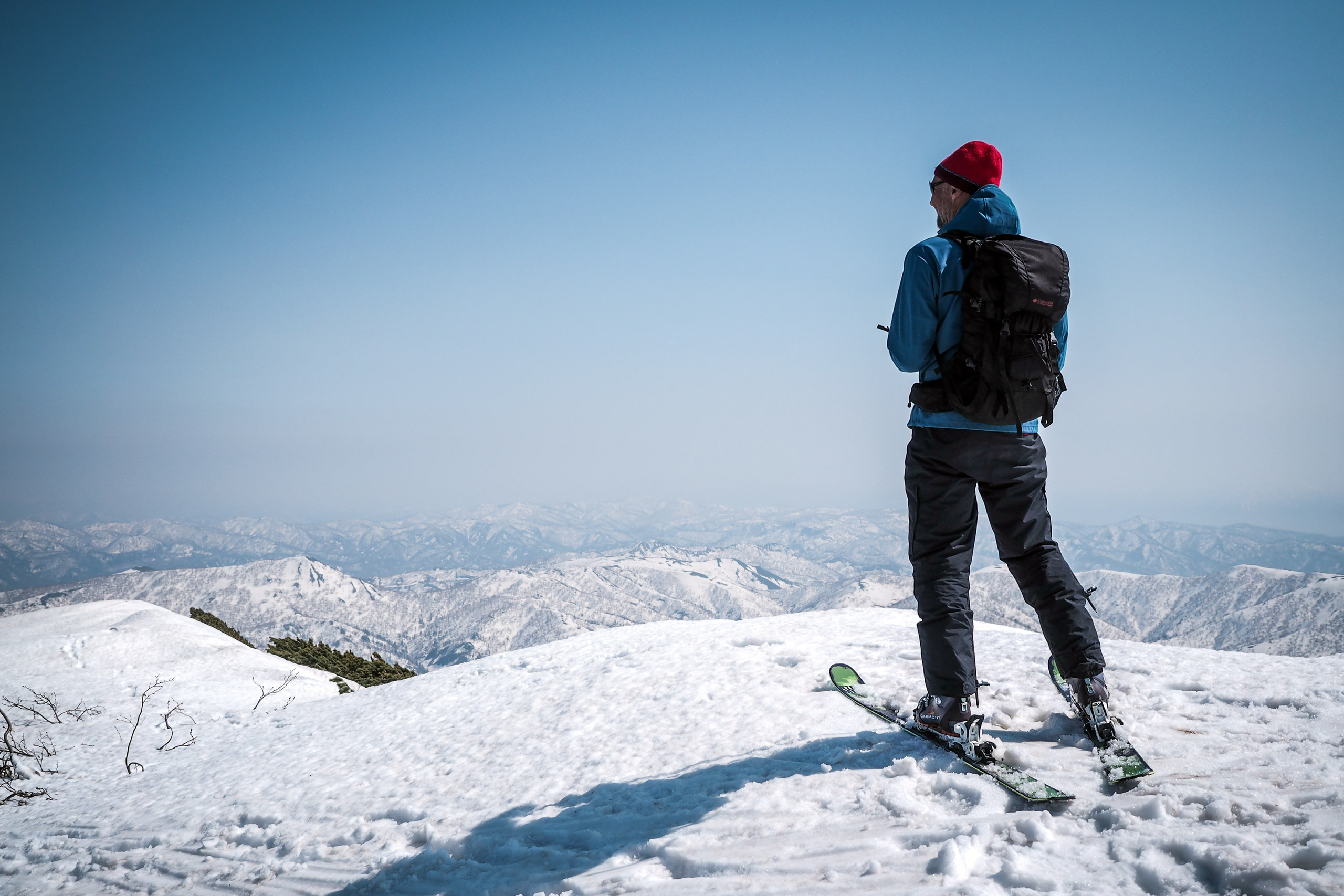 man on skis on top of mountain