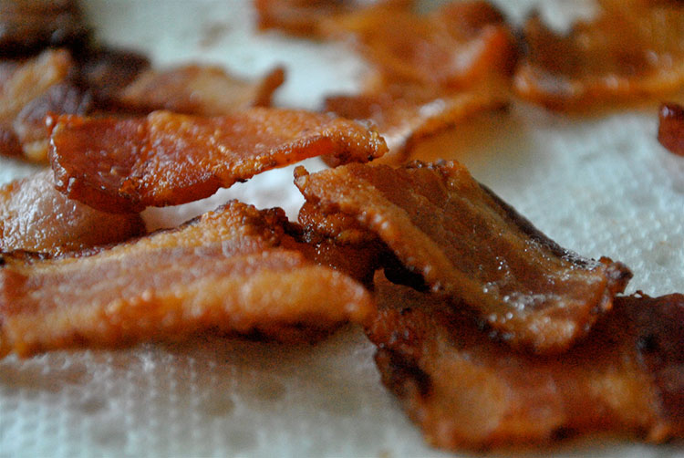 Macro photograph of cooked strips of bacon
