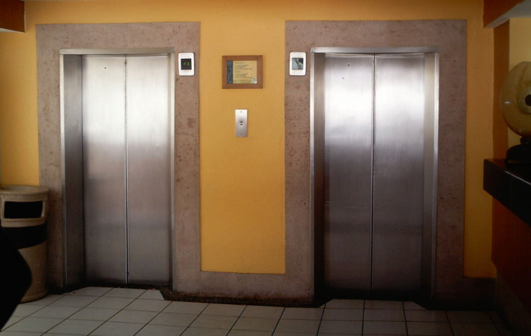 Photograph of two elevators