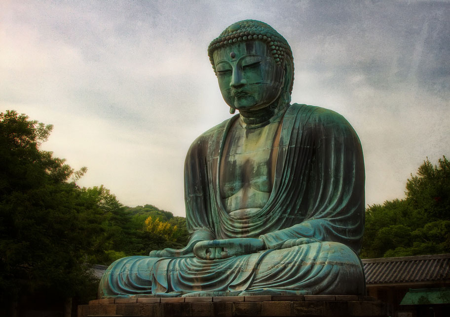 oxidized bronze daibutsu sitting buddha statue in kamakura japan