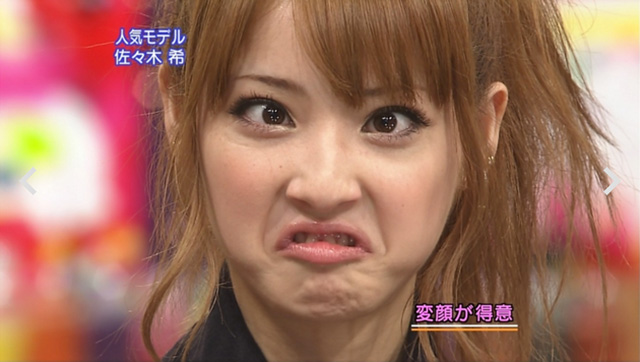 Model Nozomi Sasaki on a Japanese TV show making a weird face