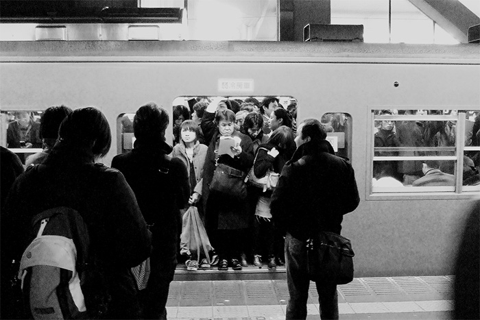 packed subway train Japan