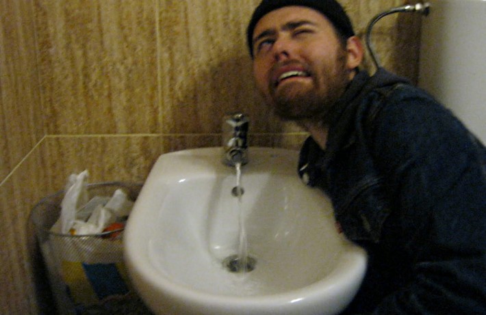 American man tries to fix his Japanese Toilet
