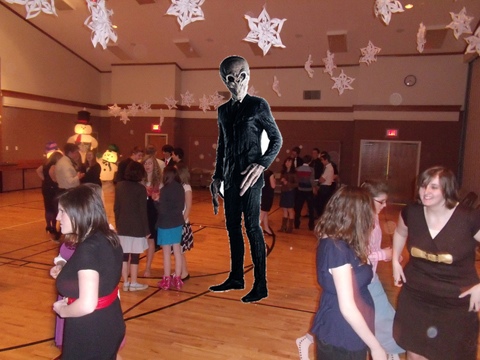 alien photoshopped onto the dance floor