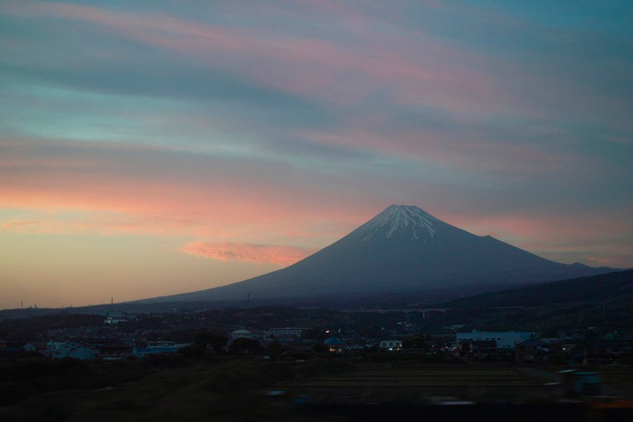 Mount Fuji in the distance at dusk