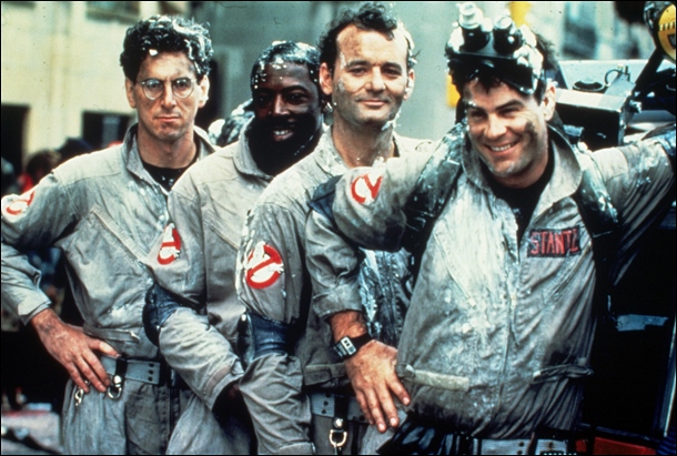 Original Ghostbusters standing together for a group shot