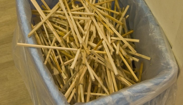 Chopsticks disposed in a trash bin