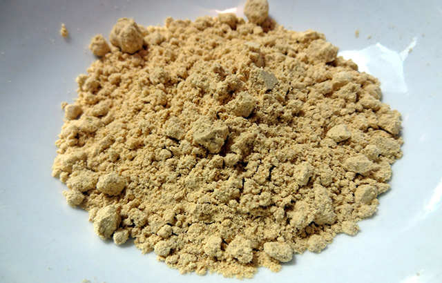 kinako powder pile of brown powder
