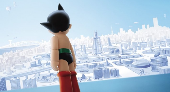 Artwork of Astro Boy overlooking a city