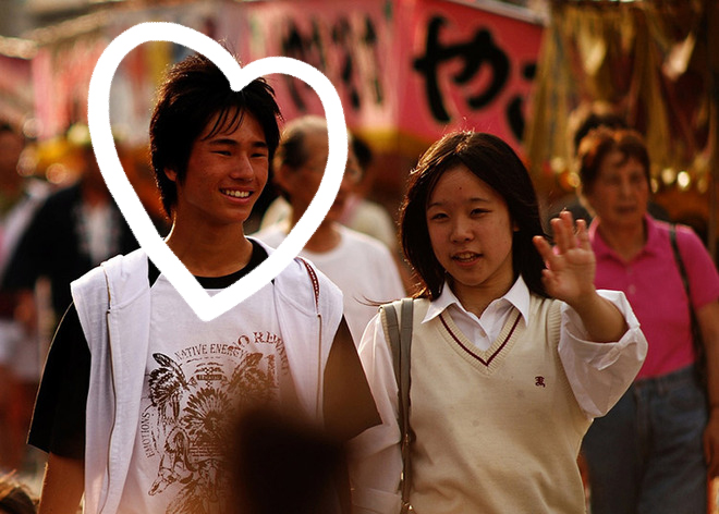 A young Japanese man celebrates his birthday with his girlfriend