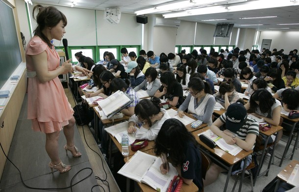 teacher preps a room full of students in south korea cram school