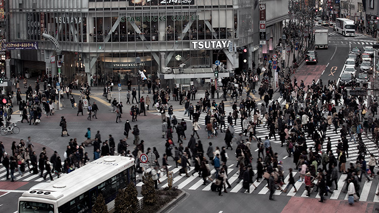 busy shibuya crossing in tokyo viewed from above