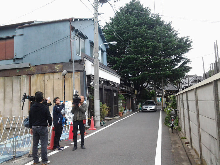 camera crew on side street