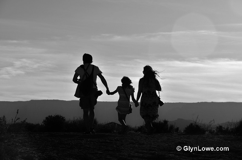 Japanese family walking through a field