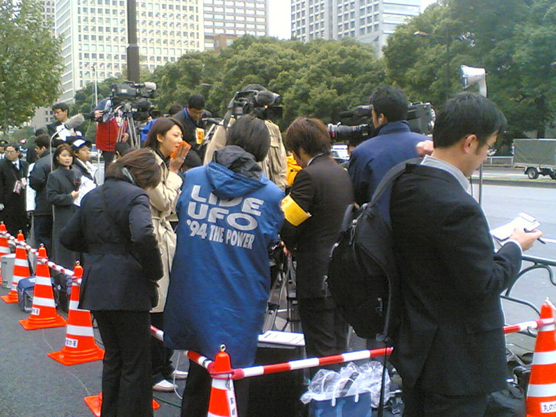 Japanese reporters in a press gang