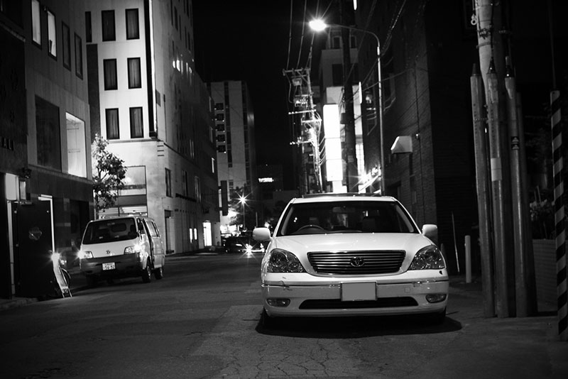 expensive car parked on street