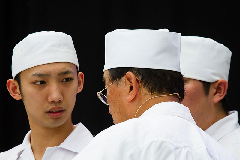 three sushi chefs together