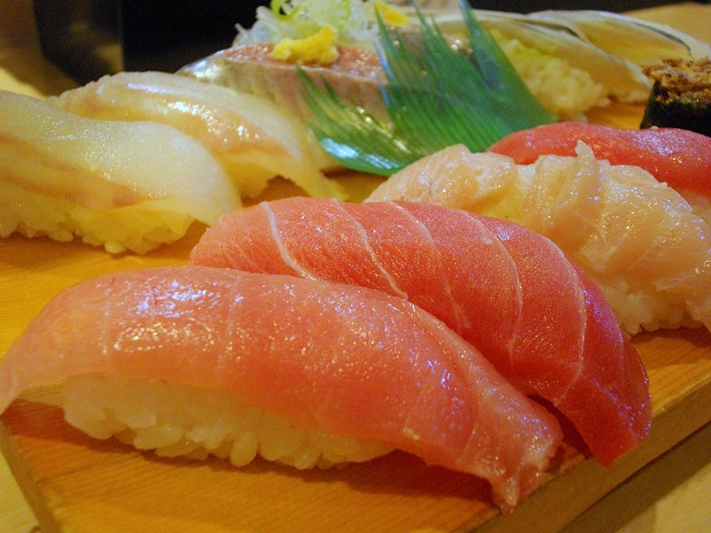 spread of sushi on platter