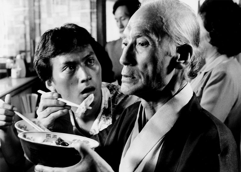 still from the movie tampopo old man takes a bite