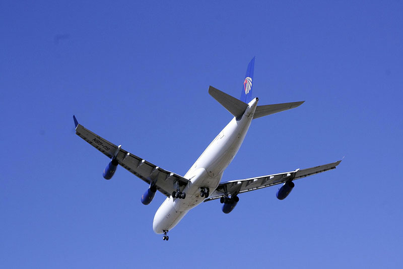 A jet carrying passengers on their second trip to Japan