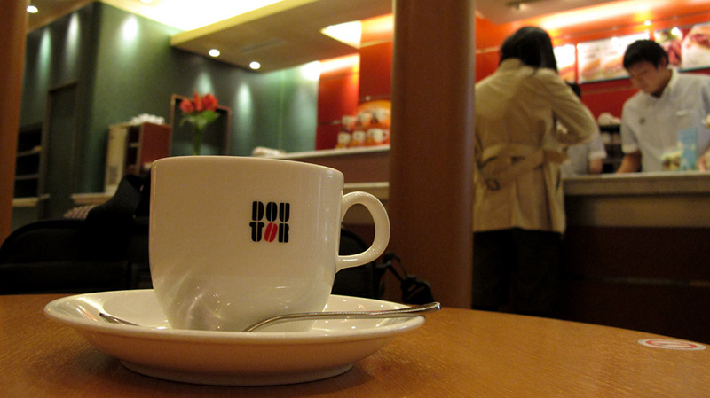 close up of coffee cup and saucer