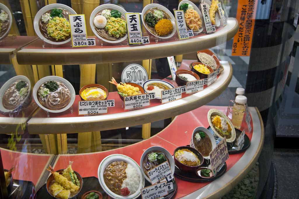 display case of plastic food dishes