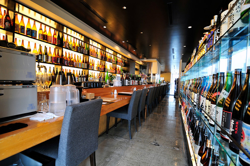 Japanese bar with Shochu bottles on display