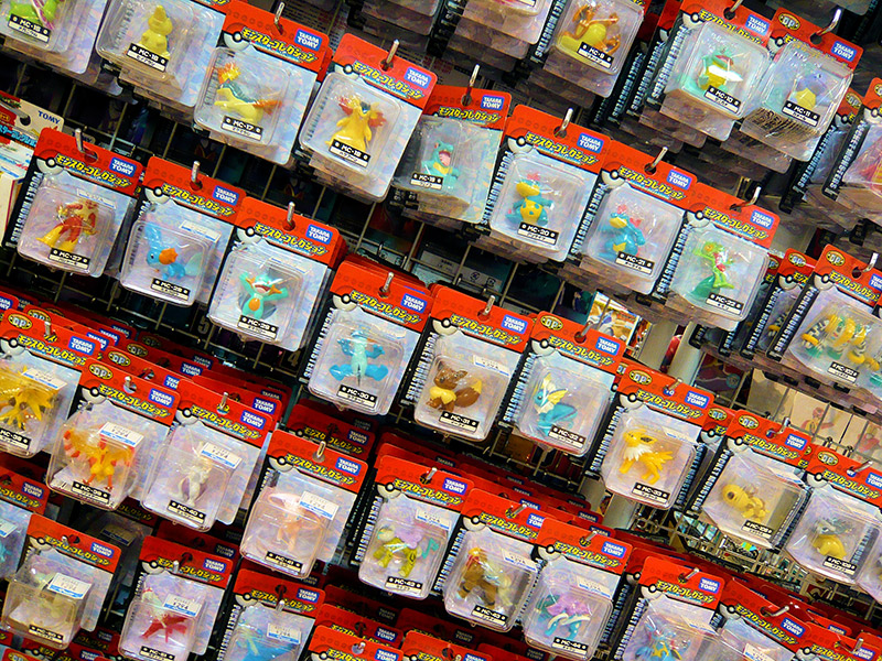 pokemon toys hanging on pegs