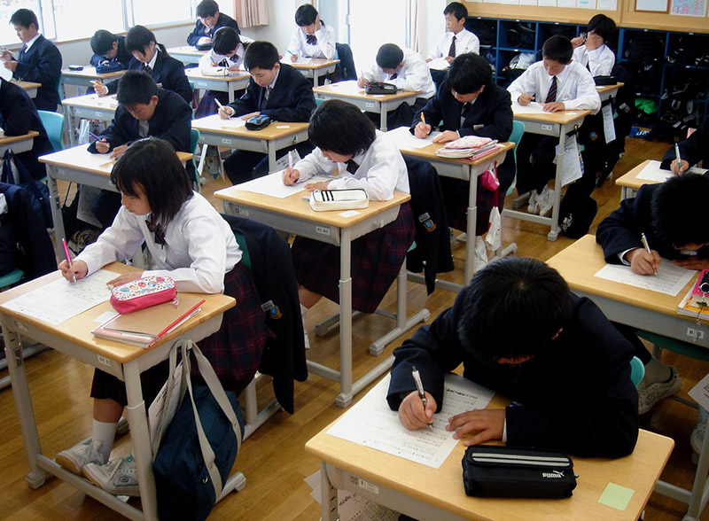 students at their desks in a Japanese classroom